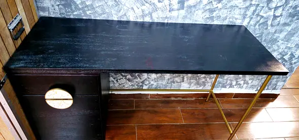 Black Wooden Desk with Gold Metal Legs and Side Drawer