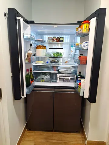 Double-door refrigerator, good working condition, stainless finish