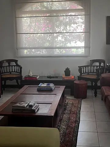 Two Antique carved wooden chair with woven cane  seats known as Connemarra chairs