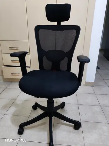 Black ergonomic office chair with headrest - good condition