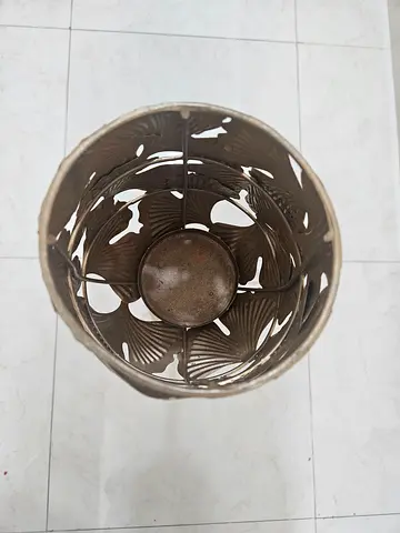 Decorative metal umbrella stand / planter with leaf cutout design