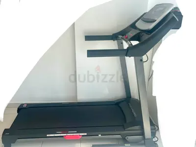 Foldable treadmill in good working condition - compact home trainer