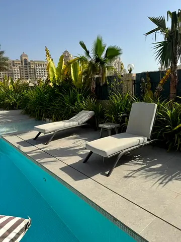 Outdoor pool sun loungers set