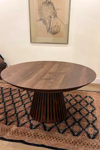 Custom Built Oval Dining Table with Smooth Matte Surface and Modern Appeal