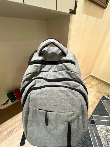 Light Grey Multi-pocket Backpack — Good Condition