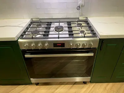 Bosch brand Stainless Steel 5-Burner Gas Range with Oven — Good Condition