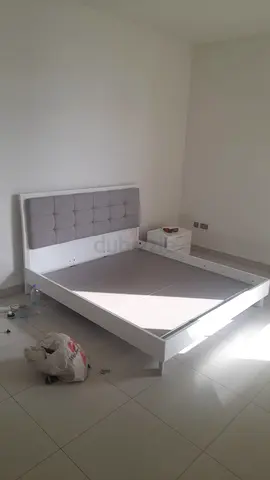King size bed with side table