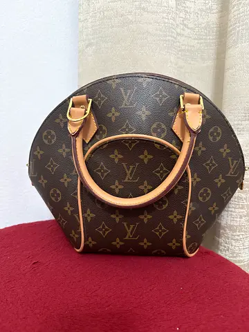 Louis Vuitton Alma Monogram Handbag