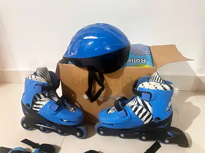 Kids adjustable inline skates with knee pads, elbow pads and helmet - size adjustable