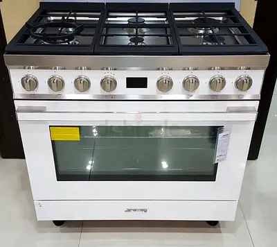 Smeg CPF9GMWH 90cm white freestanding cooking range with 6 gas burners and an extra-large oven