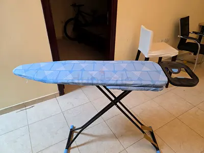 Used adjustable ironing board with cover - very good condition as good as new. Purchased in Feb.