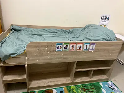 Tow Single loft bed with built-in shelves - light oak finish with tow mattress.