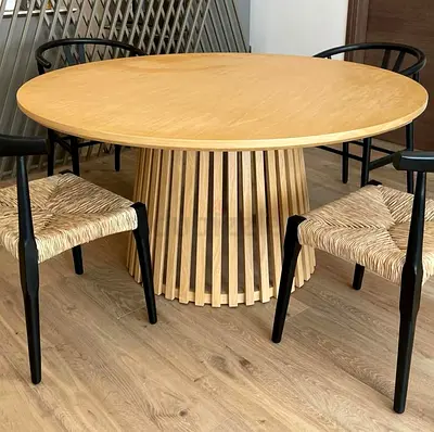 High End Modern Dining Table with Elegant round Top and Minimalist Styling