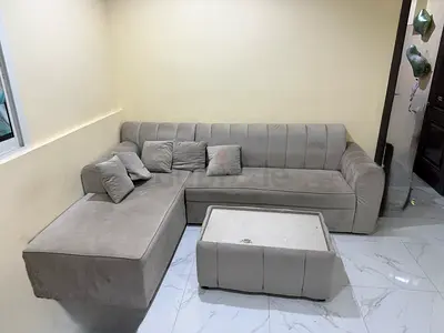 Light grey L-shaped sectional sofa with ottoman - good condition