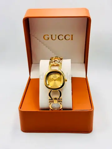 Gucci gold-tone womens bracelet watch in original box