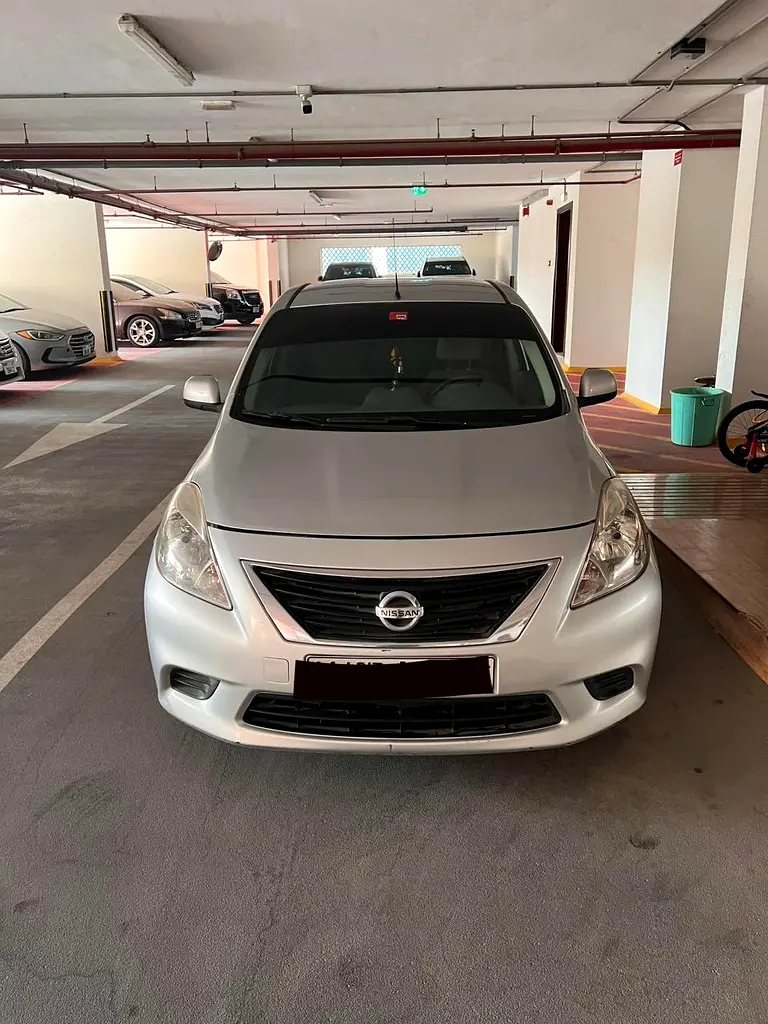 Nissan Sunny 2013 — photo 1 of 5
