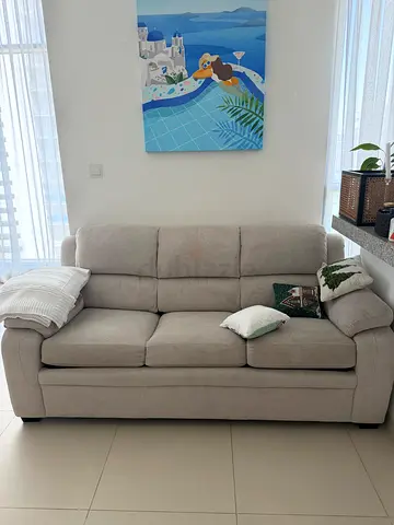Light grey 3-seater fabric sofa in good condition. It could be a bed
