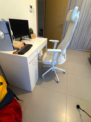 White IKEA office desk and ergonomic chair in good condition