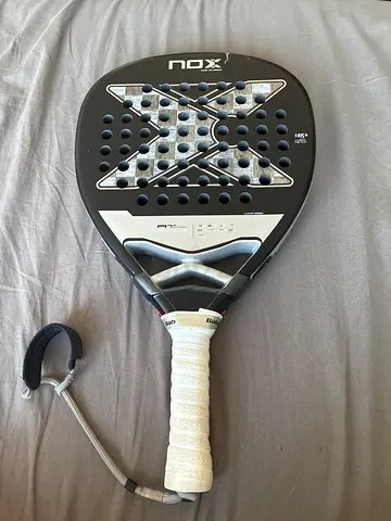NOX Padel Racket with Wrist Strap - Good Condition. Cracket at the top