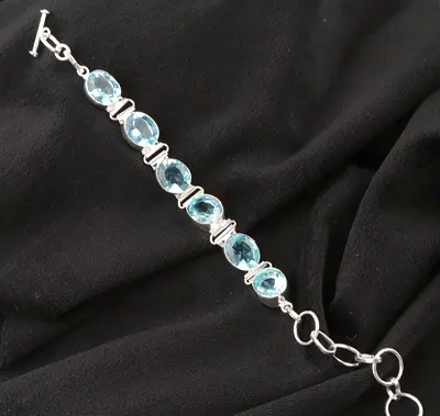Silver bracelet with topaz