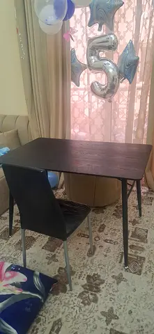 Black table with 1 chair