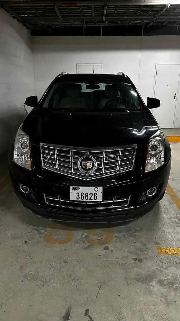 Cadillac SRX 2015 — photo 1 of 9