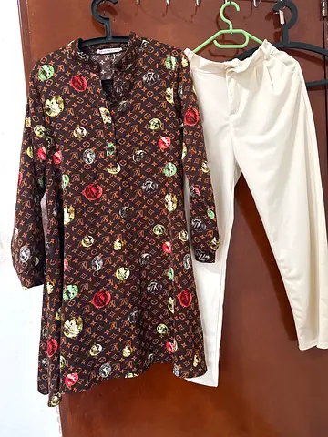 Womens pattern blazer and white trousers set