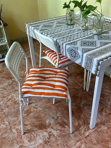 IKEA White EXTENDABLE Dining Table with 8 Chairs and chair cushions  — Good Condition