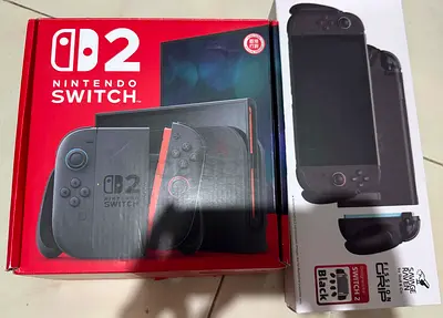 Nintendo Switch 2 with games and under warranty