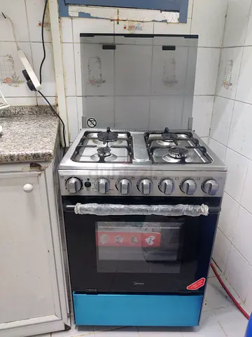 Midea 4-Burner Gas Cooker with Oven - Good Working Condition