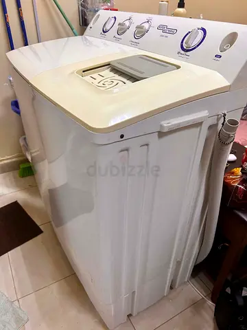 Top loading clothes washing machine
