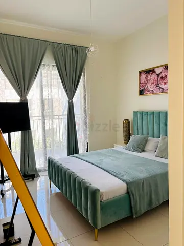 Cozy En-Suite Master Bedroom with Private Terrace in a villa with a blooming garden