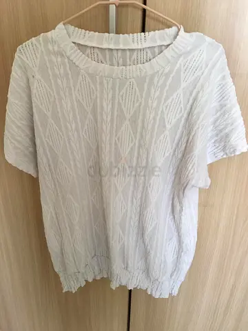 Lightweight white textured short-sleeve top, size likely M