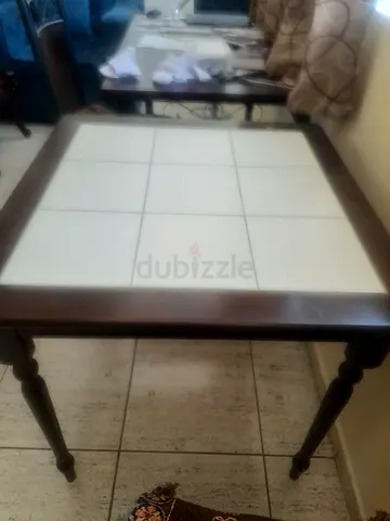 Wooden table with out chairs