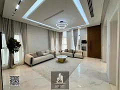 Villa for sale next to the mosque and near Sheikh Mohammed Bin Zayed Road, premium finish at an attr
