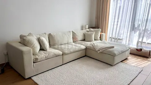 Light beige L-shaped velvet sofa with chaise (320cm x 200cm) - good condition, scratch proof
