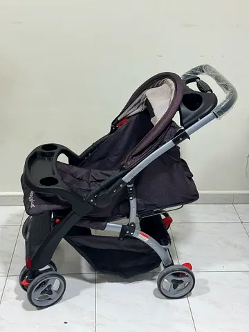 Lightweight black baby stroller in good condition