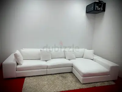 Like new condition eichholtz brand white color lshape sofa