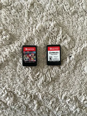 Two Nintendo Switch Games FIFA 23  Mario Kart 8 Deluxe (With the Case)