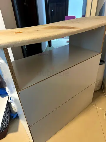 Ironing table with storage