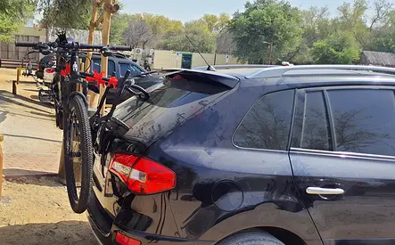 Rear-mounted bicycle rack for SUV and all type of cars — holds 2 bikes, sturdy and used