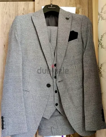 Light grey textured three-piece suit (blazer, waistcoat, trousers)