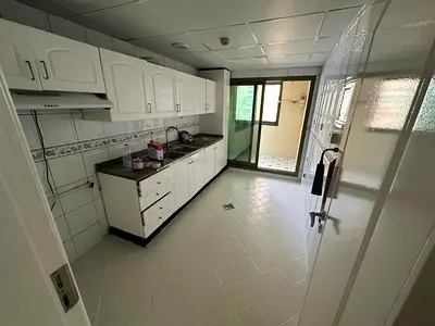 * Two-bedroom hall apartment for annual rent * Al Majaz 1 * 2 bathrooms * Free air conditioning * Prime location near Al Wahda Street and Safeer Mall