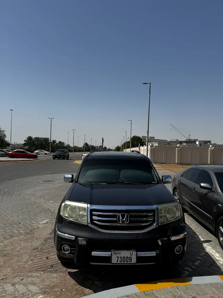 Honda Pilot 2012 — photo 1 of 9