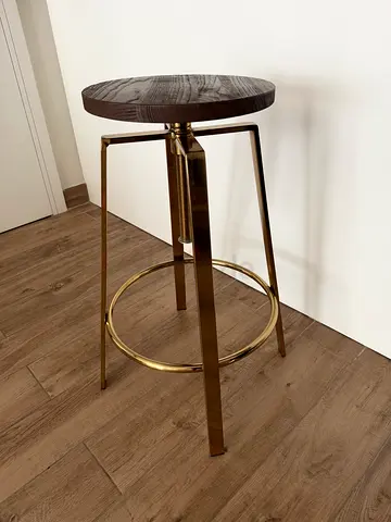Round side table with wooden top and gold metal frame. Ideal for any home with cream and brown theme