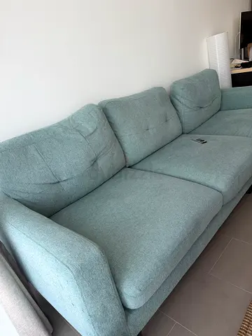 Light teal 3-seater fabric sofa in good condition