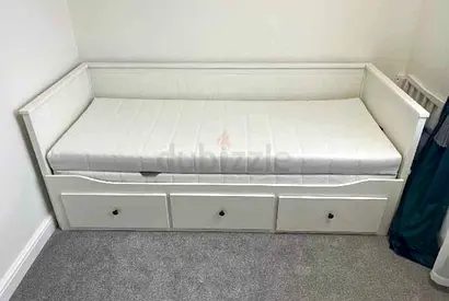 IKEA Hamnes Day bed with 3 storage drawers underneath and with 2 IKEA mattresses