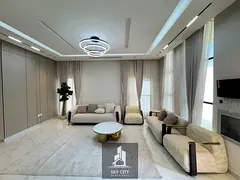 Villa for sale next to the mosque and near Sheikh Mohammed Bin Zayed Road, premium finish at an att