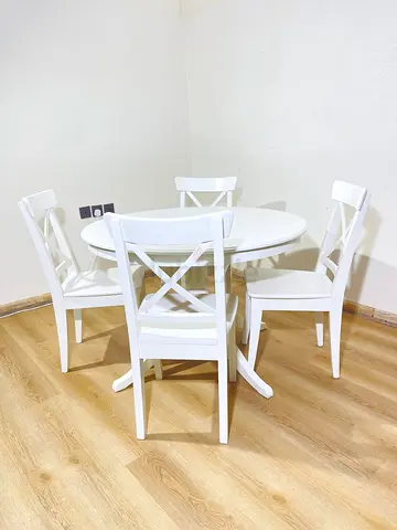 IKEA extendable dining table with 4 chairs for sale