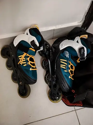 Inline rollerblades with carry bag - size adjustable can be sold separately bought from Decathlon